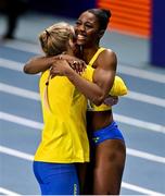 6 March 2021; Khaddi Sagnia of Sweden, right, is congratulated by a team-mate after winning bronze in the Women's Long Jump Final during the second session on day two of the European Indoor Athletics Championships at Arena Torun in Torun, Poland. Photo by Sam Barnes/Sportsfile