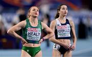 7 March 2021; Joan Healy of Ireland and Olivia Fotopoulou of Cyprus check their times after their heat of the Women's 60m heats during the first session on day three of the European Indoor Athletics Championships at Arena Torun in Torun, Poland. Photo by Sam Barnes/Sportsfile
