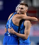 7 March 2021; Tobia Bocchi of Italy, right is congratulated by team-mate Gianmarco Tamberi after the Men's Triple Jump Final during the first session on day three of the European Indoor Athletics Championships at Arena Torun in Torun, Poland. Photo by Sam Barnes/Sportsfile