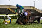 10 March 2021; Jockey Mark Walsh, right, falls from Stand Off, next to jockey Alan King who fell from Take All during the Micheal O´Murchadha Memorial Handicap hurdle at Wexford Racecourse in Wexford. Photo by David Fitzgerald/Sportsfile
