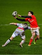 12 March 2021; Joey Carbery of Munster is tackled by Steff Hughes of Scarlets during the Guinness PRO14 match between Munster and Scarlets at Thomond Park in Limerick. Photo by Ramsey Cardy/Sportsfile