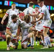 13 March 2021; John Andrew, right, is congratulated by his Ulster team-mates after scoring a try during the Guinness PRO14 match between Dragons and Ulster at Principality Stadium in Cardiff, Wales. Photo by Mark Lewis/Sportsfile