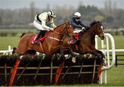 14 March 2021; On Eagles Wings, left, with Harry Swan up, jumps the last alongside eventual second place Goodbye Someday, with Denis O'Regan up, on their way to winning the Bar One Racing Kingsfurze Novice Hurdle at Naas Racecourse in Kildare. Photo by Seb Daly/Sportsfile