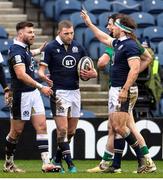 14 March 2021; Finn Russell of Scotland, centre, is congratulated by his team-mates after scoring his side's first try during the Guinness Six Nations Rugby Championship match between Scotland and Ireland at BT Murrayfield Stadium in Edinburgh, Scotland. Photo by Paul Devlin/Sportsfile