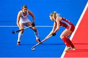 16 March 2021; Lily Owsley of Great Britain in action against Katie Mullan of Ireland during the SoftCo Series International Hockey match between Ireland and Great Britain at Queens University Sports Grounds in Belfast. Photo by Ramsey Cardy/Sportsfile