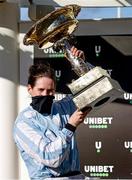 16 March 2021; Rachael Blackmore with the trophy after winning The Unibet Champion Hurdle Challenge Trophy on day 1 of the Cheltenham Racing Festival at Prestbury Park in Cheltenham, England. Pool photo by Dan Abraham/Sportsfile