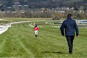 18 March 2021; Trainer Henry De Bromhead walks to meet jockey Jack Kennedy after the 4/9 favourite Envoi Allen had fallen during The Marsh Novices' Chase on day 3 of the Cheltenham Racing Festival at Prestbury Park in Cheltenham, England. Photo by Hugh Routledge/Sportsfile