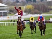 19 March 2021; Jockey Jack Kennedy on Minella Indo celebrates as he crosses the line to beat Rachael Blackmore on A Plus Tard, right, and Al Boum Photo, with Paul Townend up, during The WellChild Cheltenham Gold Cup Steeple Chase on day 4 of the Cheltenham Racing Festival at Prestbury Park in Cheltenham, England. Photo by Hugh Routledge/Sportsfile