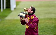 19 March 2021; Jockey Jack Kennedy, with the Gold Cup, after winning The WellChild Cheltenham Gold Cup Steeple Chase on Minella Indo during day 4 of the Cheltenham Racing Festival at Prestbury Park in Cheltenham, England. Photo by Hugh Routledge/Sportsfile