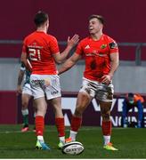 19 March 2021; Alex McHenry of Munster is congratulated by team-mate Nick McCarthy after scoring their side's first try during the Guinness PRO14 match between Munster and Benetton at Thomond Park in Limerick. Photo by Matt Browne/Sportsfile