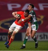 19 March 2021; Tommy O'Donnell of Munster is tackled by Tommaso Allan of Benetton during the Guinness PRO14 match between Munster and Benetton at Thomond Park in Limerick. Photo by Matt Browne/Sportsfile