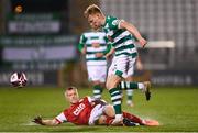 19 March 2021; Liam Scales of Shamrock Rovers is tackled by Jamie Lennon of St Patrick's Athletic during the SSE Airtricity League Premier Division match between Shamrock Rovers and St Patrick's Athletic at Tallaght Stadium in Dublin. Photo by Harry Murphy/Sportsfile