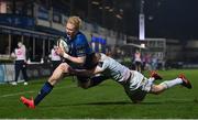 19 March 2021; Jamie Osborne of Leinster breaks past the tackle of Luke Price of Ospreys on the way to scoring his side's second try during the Guinness PRO14 match between Leinster and Ospreys at RDS Arena in Dublin. Photo by Brendan Moran/Sportsfile