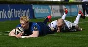 19 March 2021; Jamie Osborne of Leinster scores his side's second try despite the tackle of Luke Price of Ospreys during the Guinness PRO14 match between Leinster and Ospreys at RDS Arena in Dublin. Photo by Brendan Moran/Sportsfile