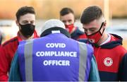 19 March 2021; St Patrick's Athletic players including Ben McCormack, right, are checked in on their arrival by a COVID-19 compliance officer before the SSE Airtricity League Premier Division match between Shamrock Rovers and St Patrick's Athletic at Tallaght Stadium in Dublin. Photo by Stephen McCarthy/Sportsfile