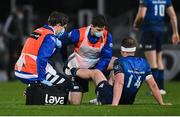 19 March 2021; Leinster Academy Physiotherapist Darragh Curley, left, and rehabilitation therapist Fearghal Kerin, treat Rory O'Loughlin for an injury during the Guinness PRO14 match between Leinster and Ospreys at RDS Arena in Dublin. Photo by Ramsey Cardy/Sportsfile