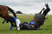 20 March 2021; Jockey Sean O'Keeffe collides with the trailing legs of Zarkareva after falling from Montagne D'argent at the last during the Pierce Molony Memorial Novice Steeplechase at Thurles Racecourse in Tipperary. Photo by Seb Daly/Sportsfile