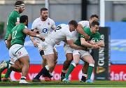 20 March 2021; Jonathan Sexton of Ireland is tackled by Owen Farrell and Billy Vunipola of England during the Guinness Six Nations Rugby Championship match between Ireland and England at Aviva Stadium in Dublin. Photo by Brendan Moran/Sportsfile