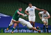20 March 2021; Tadhg Furlong of Ireland is tackled by Mako Vunipola of England during the Guinness Six Nations Rugby Championship match between Ireland and England at Aviva Stadium in Dublin. Photo by Ramsey Cardy/Sportsfile