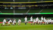 20 March 2021; Some England players take a knee for the Rugby Against Racism campaign prior to the Guinness Six Nations Rugby Championship match between Ireland and England at Aviva Stadium in Dublin. Photo by Ramsey Cardy/Sportsfile
