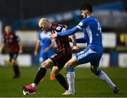 20 March 2021; Georgie Kelly of Bohemians in action against Kosovar Sadiki of Finn Harps during the SSE Airtricity League Premier Division match between Finn Harps and Bohemians at Finn Park in Ballybofey, Donegal. Photo by Harry Murphy/Sportsfile