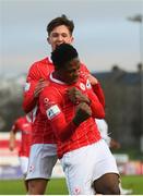 20 March 2021; Romeo Parkes celebrates after scoring his side's first goal with Sligo Rovers team-mates Johnny Kenny, left, during the SSE Airtricity League Premier Division match between Sligo Rovers and Dundalk at The Showgrounds in Sligo. Photo by Stephen McCarthy/Sportsfile