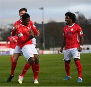 20 March 2021; Romeo Parkes celebrates after scoring his side's first goal with Sligo Rovers team-mates Johnny Kenny, left, and Walter Figueira, right, during the SSE Airtricity League Premier Division match between Sligo Rovers and Dundalk at The Showgrounds in Sligo. Photo by Stephen McCarthy/Sportsfile