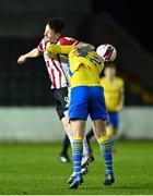 20 March 2021; David Parkhouse of Derry City in action against Joe Gorman of Longford Town during the SSE Airtricity League Premier Division match between Longford Town and Derry City at Bishopsgate in Longford. Photo by Eóin Noonan/Sportsfile