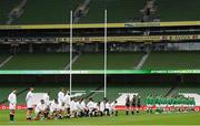 20 March 2021; Members of the England team take a knee in support of Rugby Against Racism prior to the Guinness Six Nations Rugby Championship match between Ireland and England at the Aviva Stadium in Dublin. Photo by Ramsey Cardy/Sportsfile