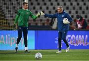 24 March 2021; Republic of Ireland goalkeeper Mark Travers, left, and Republic of Ireland goalkeeping coach Dean Kiely fist-bump ahead of the FIFA World Cup 2022 qualifying group A match between Serbia and Republic of Ireland at Stadion Rajko Mitic in Belgrade, Serbia. Photo by Stephen McCarthy/Sportsfile
