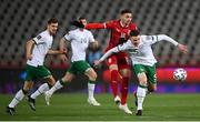 24 March 2021; Ciaran Clark of Republic of Ireland in action against Dušan Tadic of Serbia during the FIFA World Cup 2022 qualifying group A match between Serbia and Republic of Ireland at Stadion Rajko Mitic in Belgrade, Serbia. Photo by Stephen McCarthy/Sportsfile