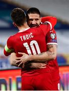 24 March 2021; Aleksandar Mitrovic of Serbia celebrates after scoring his side's second goal with team-mate Dušan Tadic, 10, during the FIFA World Cup 2022 qualifying group A match between Serbia and Republic of Ireland at Stadion Rajko Mitic in Belgrade, Serbia. Photo by Pedja Milosavljevic/Sportsfile