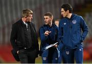24 March 2021; Republic of Ireland coach Anthony Barry, centre, speaks with manager Stephen Kenny, left, and coach Keith Andrews during the FIFA World Cup 2022 qualifying group A match between Serbia and Republic of Ireland at Stadion Rajko Mitic in Belgrade, Serbia. Photo by Stephen McCarthy/Sportsfile