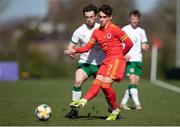 26 March 2021; Niall Huggins of Wales in action against Will Ferry of Republic of Ireland during the U21 international friendly match between Wales and Republic of Ireland at Colliers Park in Wrexham, Wales. Photo by David Rawcliffe/Sportsfile
