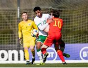 26 March 2021; Andrew Omobamidele of Republic of Ireland in action against Siôn Spence of Wales during the U21 international friendly match between Wales and Republic of Ireland at Colliers Park in Wrexham, Wales. Photo by David Rawcliffe/Sportsfile