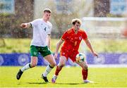 26 March 2021; Luke Jephcott of Wales in action against Mark McGuinness of Republic of Ireland during the U21 International friendly match between Wales and Republic of Ireland at Colliers Park in Wrexham, Wales. Photo by David Rawcliffe/Sportsfile