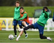 26 March 2021; Jason Knight and Cyrus Christie during a Republic of Ireland training session at the FAI National Training Centre in Abbotstown, Dublin. Photo by Seb Daly/Sportsfile