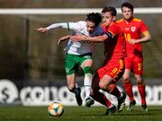 26 March 2021; Louie Watson of Republic of Ireland in action against Terry Taylor of Wales during the U21 International friendly match between Wales and Republic of Ireland at Colliers Park in Wrexham, Wales. Photo by David Rawcliffe/Sportsfile