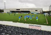 26 March 2021; Finn Harps players warm up infront of an empty away stand prior to the SSE Airtricity League Premier Division match between Dundalk and Finn Harps at Oriel Park in Dundalk, Louth. Photo by Eóin Noonan/Sportsfile