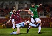 26 March 2021; Lee Devitt of Cobh Ramblers attempts to get on the end of a cross under pressure from Robert Slevin of Cork City during the SSE Airtricity League First Division match between Cork City and Cobh Ramblers at Turners Cross in Cork. Photo by Harry Murphy/Sportsfile