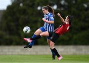 27 March 2021; Eve O'Sullivan of Treaty United in action against Isobel Finnegan of Bohemians during the SSE Airtricity Women's National League match between Bohemians and Treaty United at Oscar Traynor Centre in Coolock, Dublin. Photo by Piaras Ó Mídheach/Sportsfile