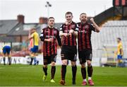 27 March 2021; Ross Tierney of Bohemians, centre, celebrates after scoring his side's second goal, with team-mates Liam Burt, left, and Keith Ward during the SSE Airtricity League Premier Division match between Bohemians and Longford Town at Dalymount Park in Dublin. Photo by Sam Barnes/Sportsfile