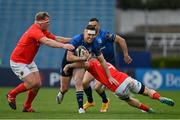 27 March 2021; Rory O'Loughlin of Leinster is tackled by John Ryan and Andrew Conway of Munster during the Guinness PRO14 Final match between Leinster and Munster at the RDS Arena in Dublin. Photo by Brendan Moran/Sportsfile