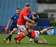 27 March 2021; Rory O'Loughlin of Leinster is tackled by John Ryan and Andrew Conway of Munster during the Guinness PRO14 Final match between Leinster and Munster at the RDS Arena in Dublin. Photo by Brendan Moran/Sportsfile