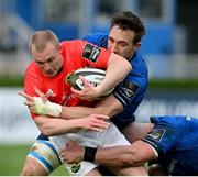 27 March 2021; Keith Earls of Munster is tackled by Jack Conan and Rhys Ruddock, right, of Leinster during the Guinness PRO14 Final match between Leinster and Munster at the RDS Arena in Dublin. Photo by Ramsey Cardy/Sportsfile