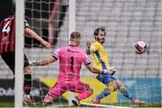 27 March 2021; Conor Davis of Longford Town scores his side's second goal, despite the efforts of James Talbot of Bohemians, centre, and team-mate Rory Feely during the SSE Airtricity League Premier Division match between Bohemians and Longford Town at Dalymount Park in Dublin. Photo by Sam Barnes/Sportsfile