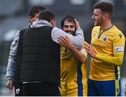 27 March 2021; Conor Davis of Longford Town, who scored twice in the second half, is congratulated by Longford Town manager Daire Doyle, left, and team-mates following the SSE Airtricity League Premier Division match between Bohemians and Longford Town at Dalymount Park in Dublin. Photo by Sam Barnes/Sportsfile