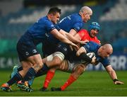 27 March 2021; Rhys Ruddock of Leinster supported by team-mates Rónan Kelleher, left, and Devin Toner is tackled by Tadhg Beirne of Munster during the Guinness PRO14 Final match between Leinster and Munster at the RDS Arena in Dublin. Photo by David Fitzgerald/Sportsfile