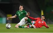 27 March 2021; Jason Knight of Republic of Ireland is tackled by Olivier Thill of Luxembourg during the FIFA World Cup 2022 qualifying group A match between Republic of Ireland and Luxembourg at the Aviva Stadium in Dublin. Photo by Harry Murphy/Sportsfile