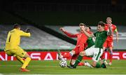 27 March 2021; James Collins of Republic of Ireland has a shot on goal despite the attempts of Enes Mahmutovic of Luxembourg during the FIFA World Cup 2022 qualifying group A match between Republic of Ireland and Luxembourg at the Aviva Stadium in Dublin. Photo by Harry Murphy/Sportsfile